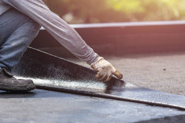 Professional Basement Waterproofing technician working in Clayton, OH
